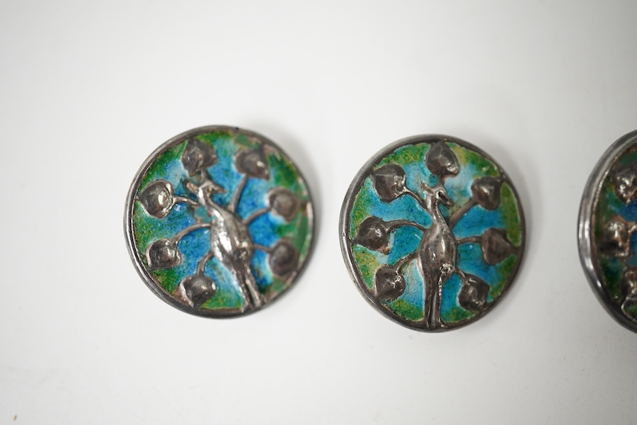 A set of 4 Liberty & Co Cymric enamelled silver buttons, decorated with peacocks, Birmingham 1901, 26mm, Condition - good